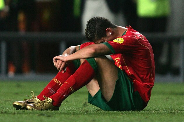 LISBON, PORTUGAL - JULY 4:  Cristiano Ronaldo of Portugal in tears after the UEFA Euro 2004, Final match between Portugal and Greece at the Luz Stadium on July 4, 2004 in Lisbon, Portugal.  Greece defeated Portugal 1-0.  (Photo by Ben Radford/Getty Images)