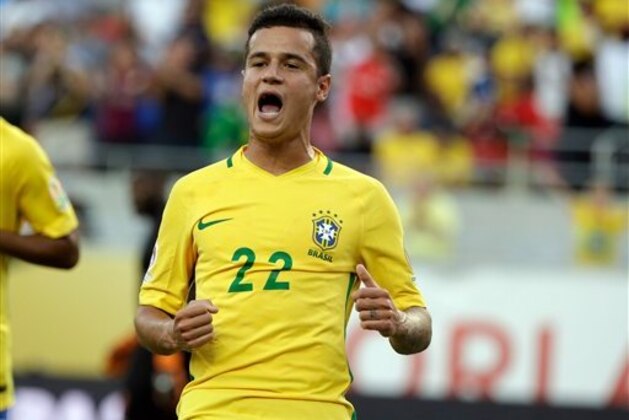 Brazil's Philippe Coutinho (22) celebrates after scoring a gaol against Haiti during the first half of a Copa America group B soccer match at Camping World Stadium, Wednesday, June 8, 2016, in Orlando, Fla. (AP Photo/John Raoux)