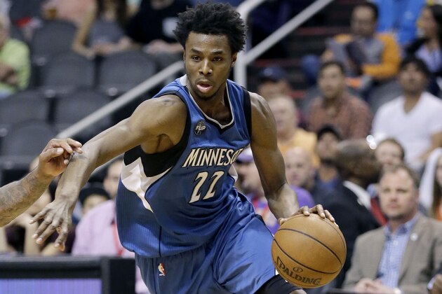 Minnesota Timberwolves' Andrew Wiggins (22) drives against the Phoenix Suns during the first half of an NBA basketball game, Monday, March 14, 2016, in Phoenix.  (AP Photo/Matt York)