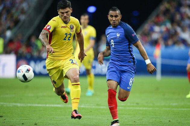 (L-R)  Cristian Sapuaru of Romania, Dimitri Payet of France during the Euro group stage match between France and Romania at the Stade de France on june 10, 2016 in Saint-Denis, France(Photo by VI Images via Getty Images)