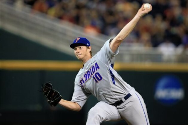 FILE- In this June 15, 2015, file photo, Florida pitcher A.J. Puk delivers against Virginia in an NCAA College World Series baseball game in Omaha, Neb. The Florida Gators are so deep on the mound that Puk isn't even the Friday night starter. It's Logan Shore, but the 6-7, 230-pounder could be the No. 1 pick in the draft. He leaned on a mid-90s fastball for 104 strikeouts in 78 innings. (AP Photo/Nati Harnik, file)