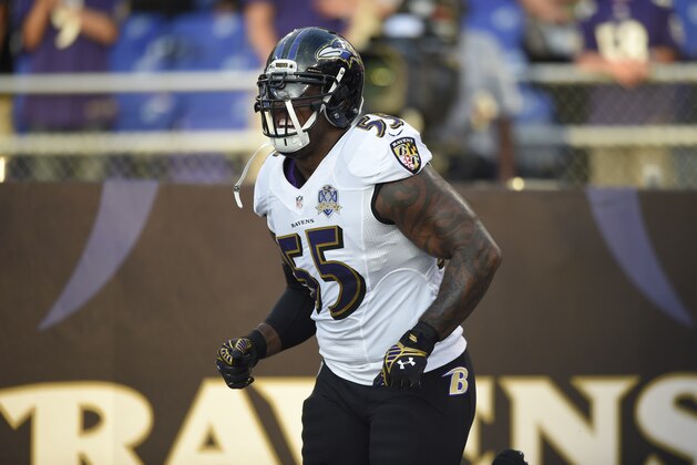 Baltimore Ravens outside linebacker Terrell Suggs (55) runs onto the field before an NFL preseason football game against the New Orleans Saints, Thursday, Aug. 13, 2015, in Baltimore. (AP Photo/Nick Wass)