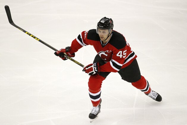New Jersey Devils right wing Paul Thompson skates against the Boston Bruins during the third period of an NHL hockey game, Friday, Jan. 8, 2016, in Newark, N.J. The Bruins won 4-1. (AP Photo/Julio Cortez)