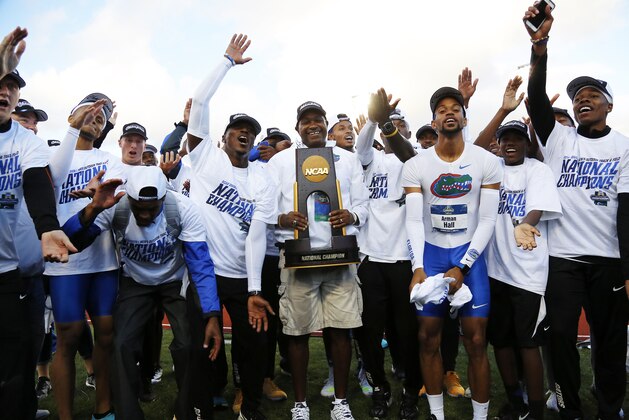 Florida celebrates winning the men's team title at the NCAA outdoor track and field championships in Eugene, Ore., Friday, June 10, 2016. (AP Photo/Ryan Kang)