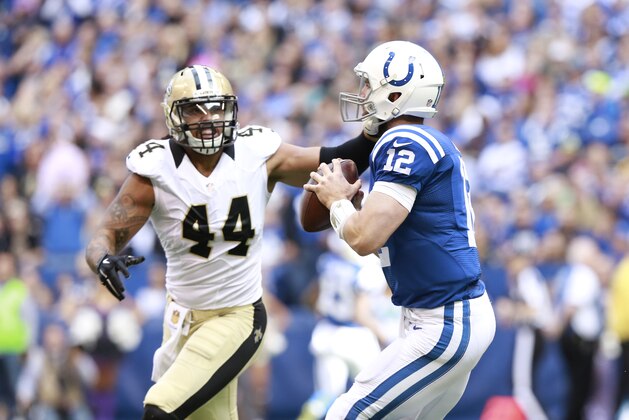 New Orleans Saints outside linebacker Hau'oli Kikaha (44) pressures Indianapolis Colts quarterback Andrew Luck (12) in the first half of an NFL football game in Indianapolis, Sunday, Oct. 25, 2015.  (AP Photo/R Brent Smith)