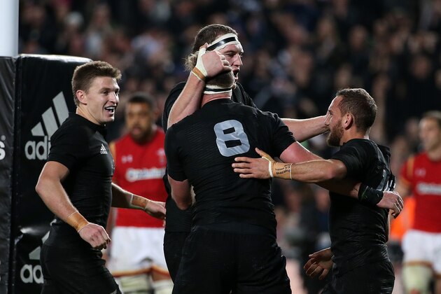 AUCKLAND, NEW ZEALAND - JUNE 11:  All Blacks captain Kieran Read (C) scores a try congratulated by Brodie Retallick (CR) Aaron Cruden (R) and Beauden Barrett (L) during the International Test match between the New Zealand All Blacks and Wales at Eden Park on June 11, 2016 in Auckland, New Zealand.  (Photo by Fiona Goodall/Getty Images)