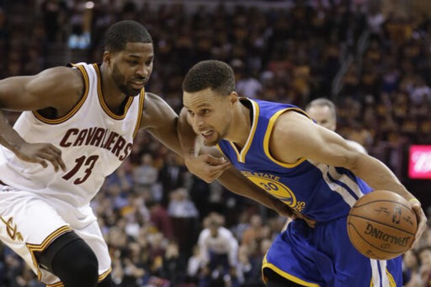 Golden State Warriors guard Stephen Curry (30) drives on Cleveland Cavaliers center Tristan Thompson (13) during the first half of Game 4 of basketball's NBA Finals in Cleveland, Friday, June 10, 2016. (AP Photo/Tony Dejak)