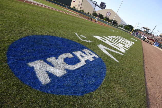 The NCAA logo is painted alongside the visitor dugout at Olsen Field before the start of a NCAA college baseball super regional tournament game between TCU and Texas A&M, Friday, June 10, 2016, in College Station, Texas. TCU won game one of the series 8-2. (AP Photo/Sam Craft)