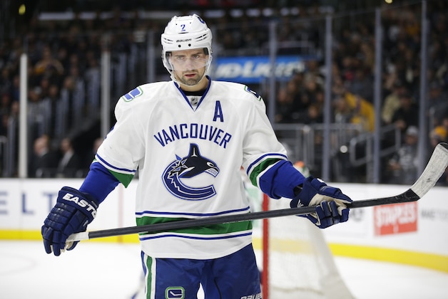 FILE - In this Dec. 1, 2015, file photo, Vancouver Canucks' Dan Hamhuis skates during the second period of an NHL hockey game against the Los Angeles Kings, in Los Angeles. It's rebuilding time in Toronto and replenishing time in Montreal, Calgary, Edmonton, Winnipeg and Vancouver. The Canucks have perhaps the best rental player still available in defenseman Dan Hamhuis, and Flames blue liner Kris Russell should be highly sought after, too. (AP Photo/Jae C. Hong, File)