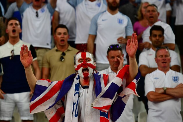 MARSEILLE, FRANCE - JUNE 11: An England supporter cheer during the UEFA EURO 2016 Group B match between England and Russia at Stade Velodrome on June 11, 2016 in Marseille, France.  (Photo by Dan Mullan/Getty Images)