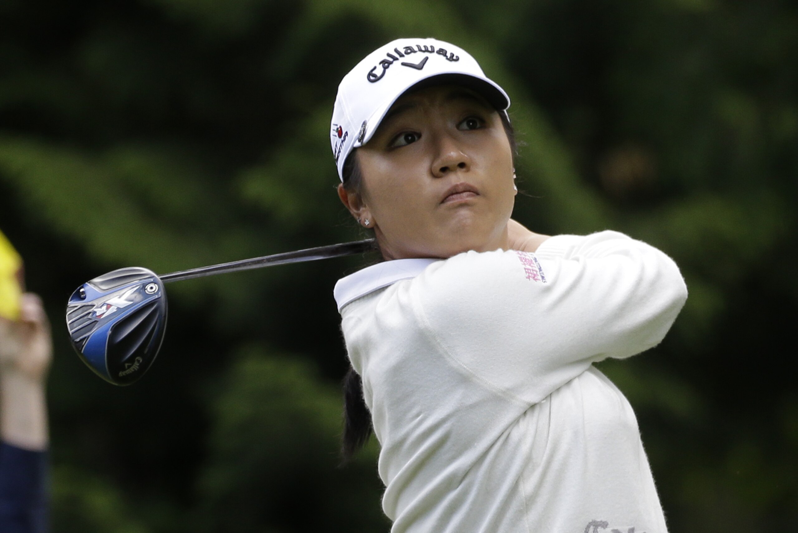 Lydia Ko tees in action in the third round at the Women’s PGA Championship golf tournament at Sahalee Country Club Saturday, June 11, 2016, in Sammamish, Wash. (AP Photo/Elaine Thompson)