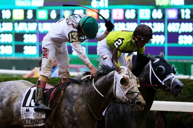 ELMONT, NY - JUNE 11:  Jockey Irad Ortiz Jr. celebrates atop Creator after winning the The 148th running of the Belmont Stakes at Belmont Park on June 11, 2016 in Elmont, New York.  (Photo by Mike Stobe/Getty Images)