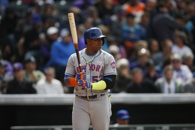 New York Mets center fielder Yoenis Cespedes (52) in the sixth inning of a baseball game Sunday, May 15, 2016, in Denver. Colorado won 4-3. (AP Photo/David Zalubowski)