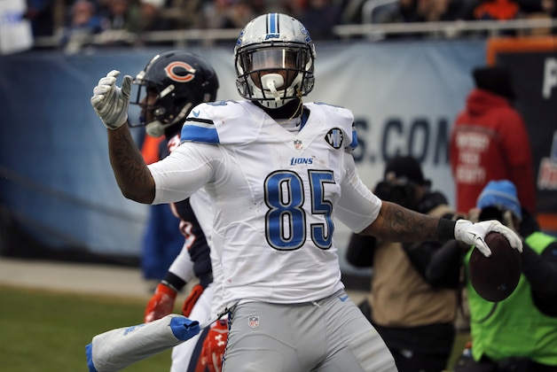 Detroit Lions tight end Eric Ebron (85) celebrates a touchdown in the end zone during the second half of an NFL football game against the Chicago Bears, Sunday, Jan. 3, 2016, in Chicago. (AP Photo/Charles Rex Arbogast)