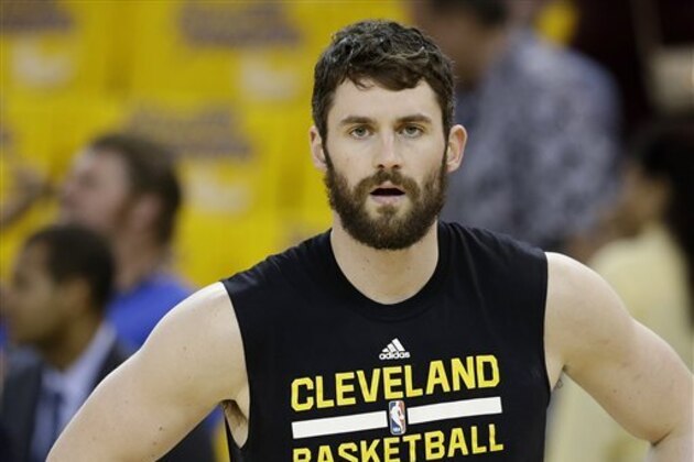 Cleveland Cavaliers forward Kevin Love warms up before Game 2 of basketball's NBA Finals between the Golden State Warriors and the Cavaliers in Oakland, Calif., Sunday, June 5, 2016. (AP Photo/Marcio Jose Sanchez)