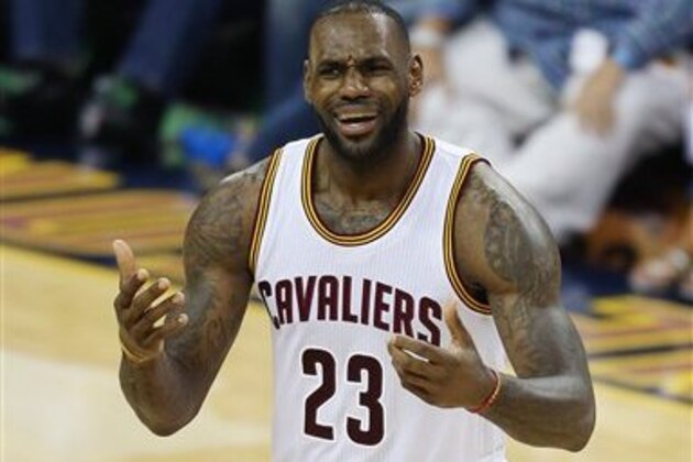 Cleveland Cavaliers forward LeBron James (23) against the Golden State Warriors during the second half of Game 3 of basketball's NBA Finals in Cleveland, Wednesday, June 8, 2016. (AP Photo/Ron Schwane)