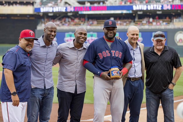Jun 10, 2016; Minneapolis, MN, USA; From left to right Minnesota Twins bullpen coach Eddie Guardado, LaTroy Hawkins, Boston Red Sox designated hitter David Ortiz (34), Corey Koskie and Ron Gardenhire pose for a photo during David Ortiz' final season tribute at Target Field. Mandatory Credit: Jesse Johnson-USA TODAY Sports