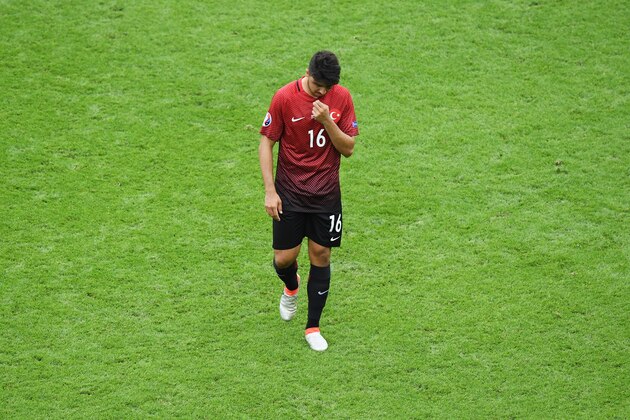 PARIS, FRANCE - JUNE 12: Ozan Tufan of Turkey leaves the pitch after his team's 0-1 defeat in the UEFA EURO 2016 Group D match between Turkey and Croatia at Parc des Princes on June 12, 2016 in Paris, France.  (Photo by Matthias Hangst/Getty Images)