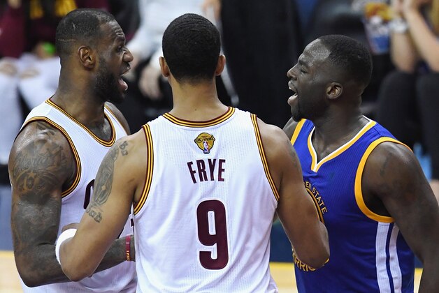 CLEVELAND, OH - JUNE 10:  LeBron James #23 of the Cleveland Cavaliers exchanges words with Draymond Green #23 of the Golden State Warriors during the second half in Game 4 of the 2016 NBA Finals at Quicken Loans Arena on June 10, 2016 in Cleveland, Ohio. NOTE TO USER: User expressly acknowledges and agrees that, by downloading and or using this photograph, User is consenting to the terms and conditions of the Getty Images License Agreement.  (Photo by Jason Miller/Getty Images)