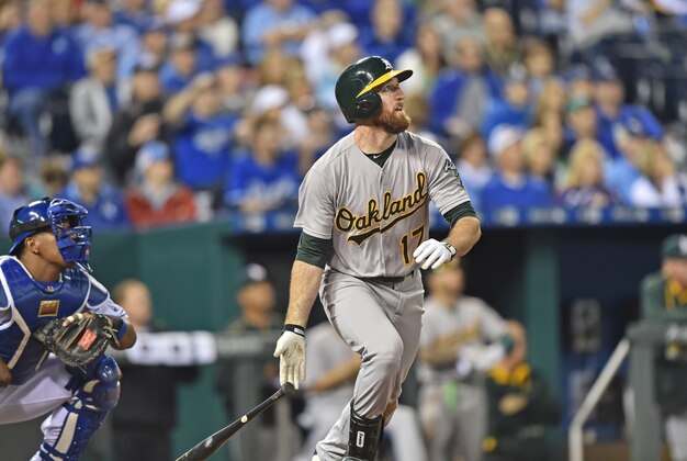 Apr 18, 2015; Kansas City, MO, USA; Oakland Athletics first basemen Ike Davis (17) at bat against the Kansas City Royals during the eighth inning at Kauffman Stadium. Mandatory Credit: Peter G. Aiken-USA TODAY Sports