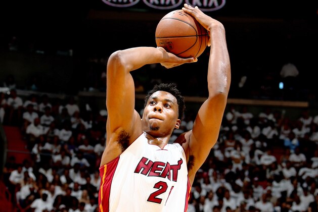 MIAMI, FL - MAY 1:  Hassan Whiteside #21 of the Miami Heat shoots a free throw against the Charlotte Hornets in Game Seven of the Eastern Conference Quarterfinals during the 2016 NBA Playoffs on May 1, 2016 at American Airlines Arena in Miami, Florida. NOTE TO USER: User expressly acknowledges and agrees that, by downloading and or using this Photograph, user is consenting to the terms and conditions of the Getty Images License Agreement. Mandatory Copyright Notice: Copyright 2016 NBAE (Photo by Nathaniel S. Butler/NBAE via Getty Images)