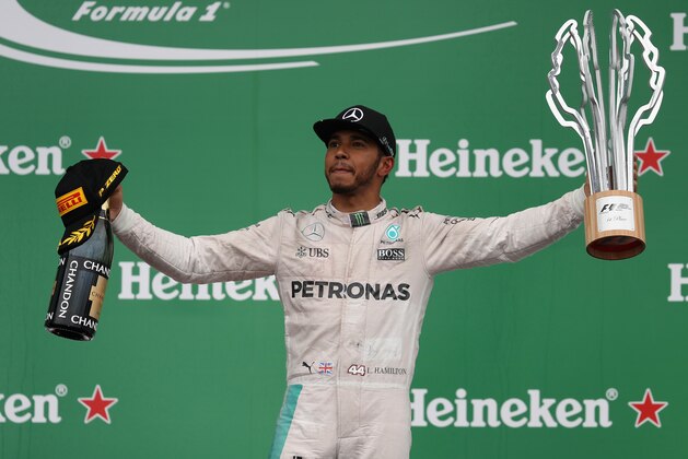 MONTREAL, QC - JUNE 12:  Lewis Hamilton of Great Britain and Mercedes GP celebrates his win during the Canadian Formula One Grand Prix at Circuit Gilles Villeneuve on June 12, 2016 in Montreal, Canada.  (Photo by Mark Thompson/Getty Images)