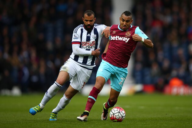 WEST BROMWICH, ENGLAND - APRIL 30: Dimitri Payet of West Ham United and Sandro of West Bromwich Albion compete for the ball during the Barclays Premier League match between West Bromwich Albion and West Ham United at The Hawthorns on April 30, 2016 in West Bromwich, England.  (Photo by Ian Walton/Getty Images)