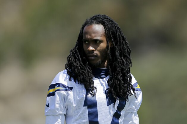 San Diego Chargers wide receiver Travis Benjamin stretches during an NFL football practice Monday, June 6, 2016, in San Diego. (AP Photo/Gregory Bull)