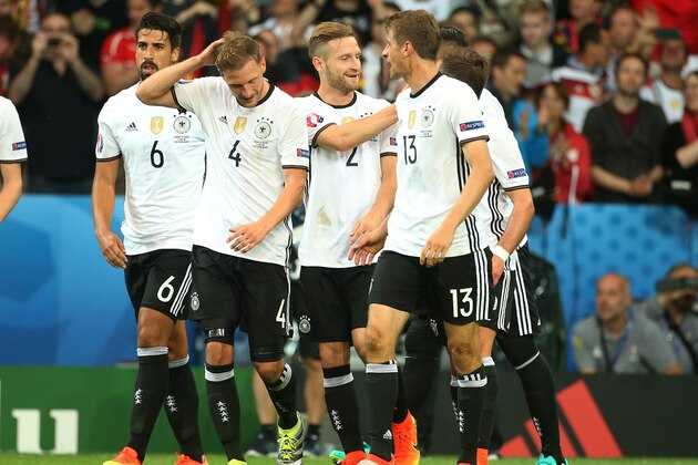 LILLE, FRANCE - JUNE 12: Shkodran Mustafi of Germany celebrates his goal with teammates during the UEFA Euro 2016 Group C match between Germany and Ukraine at Stade Pierre Mauroy on June 12, 2016 in Lille, France. (Photo by Jean Catuffe/Getty Images)