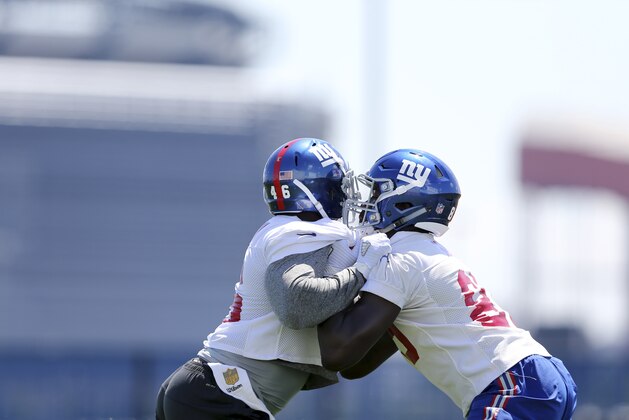New York Giants full back Will Johnson, left, (46) and tight end Jerell Adams (89) work on a drill during practice at the New York Giants football training facility Monday, June 6, 2016, in East Rutherford, N.J. (AP Photo/Mel Evans)