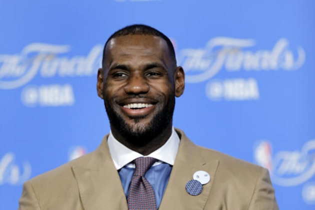 Cleveland Cavaliers' LeBron James smiles at a reporter's question early Thursday, June 9, 2016, after the Cavaliers defeated the Golden State Warriors 120-90 in Game 3 of basketball's NBA Finals in Cleveland. (AP Photo/Tony Dejak)