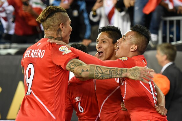 Peru's Raul Ruidiaz (2-R) celebrates after scoring against Brazil during their Copa America Centenario football tournament match in Foxborough, Massachusetts, United States, on June 12, 2016.  / AFP / Timothy A. CLARY        (Photo credit should read TIMOTHY A. CLARY/AFP/Getty Images)