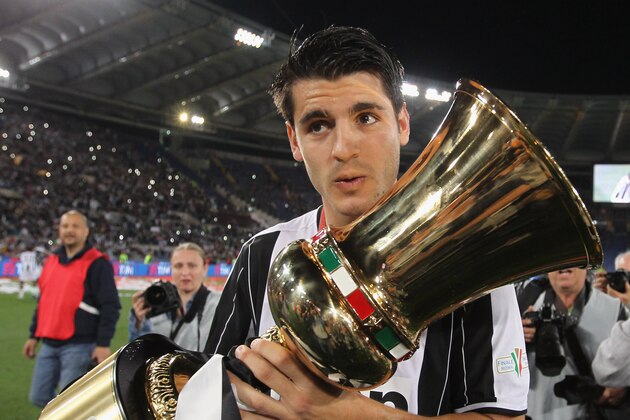 ROME, ITALY - MAY 21:  Alvaro Morata of Juventus FC celebrates with the trophy after winning the TIM Cup final match against AC Milan at Stadio Olimpico on May 21, 2016 in Rome, Italy.  (Photo by Paolo Bruno/Getty Images)