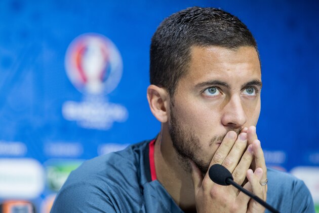 DECINES-CHARPIEU, FRANCE - JUNE 12:  In this handout image provided by UEFA, Eden Hazard of Belgium reacts during the Belgium press conference on June 12, 2016 in Decines-Charpieu, France. (Photo by Handout/UEFA via Getty Images)