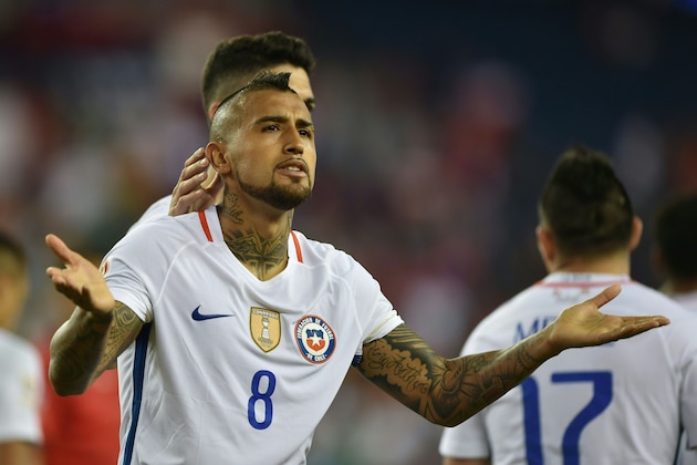Chile's Arturo Vidal celebrates after scoring against Bolivia during the Copa America Centenario football tournament in Foxborough, Massachusetts, United States, on June 10, 2016.  / AFP / HECTOR RETAMAL        (Photo credit should read HECTOR RETAMAL/AFP/Getty Images)