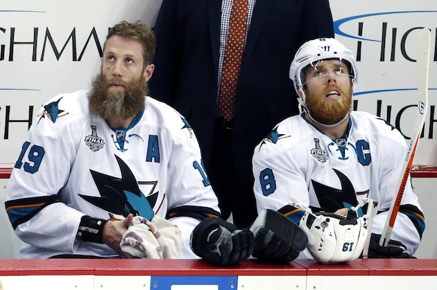 San Jose Sharks' Joe Thornton, left, and Joe Pavelski sit on the bench during the second period in Game 5 of the NHL hockey Stanley Cup Finals against the Pittsburgh Penguins on Thursday, June 9, 2016, in Pittsburgh. (AP Photo/Gene J. Puskar)