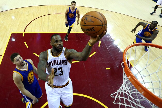 Jun 10, 2016; Cleveland, OH, USA; Golden State Warriors forward Draymond Green (23) shoots the ball against Golden State Warriors guard Klay Thompson (11) in game four of the NBA Finals at Quicken Loans Arena. Mandatory Credit: Ronald Martinez/Pool Photo via USA TODAY Sports