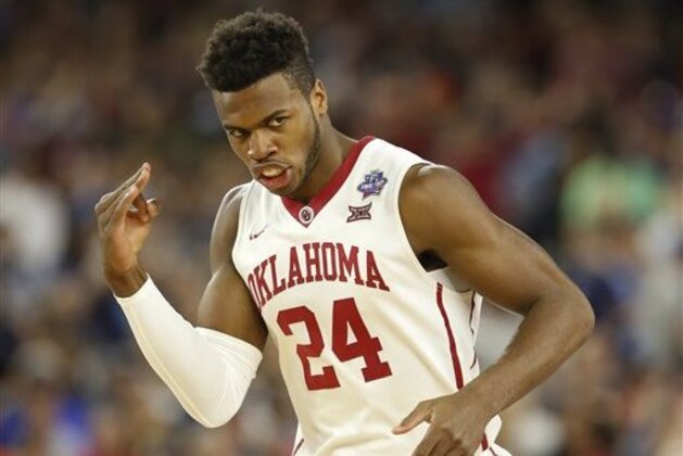 Oklahoma's Buddy Hield reacts to a three point basket during the first half of the NCAA Final Four tournament college basketball semifinal game against Villanova, Saturday, April 2, 2016, in Houston. (AP Photo/Eric Gay)