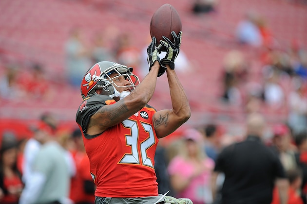 TAMPA, FL - NOVEMBER 09: Isaiah Frey #32 of the Tampa Bay Buccaneers catches a pass during warmups before the game against the Atlanta Falcons at Raymond James Stadium on November 9, 2014 in Tampa, Florida.  (Photo by Cliff McBride/Getty Images)