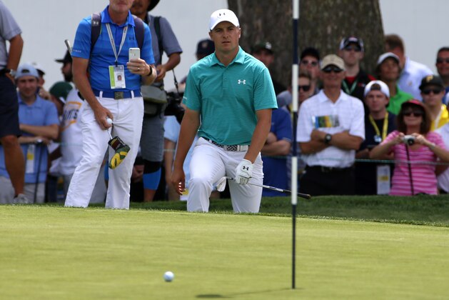 Defending U.S. Open Champion Jordan Spieth walks onto the 17th green during a practice round for the 2016 US Open golf championship, at Oakmont Country Club in Oakmont, Pa., Monday, June 13, 2016. (AP Photo/Gene J. Puskar)