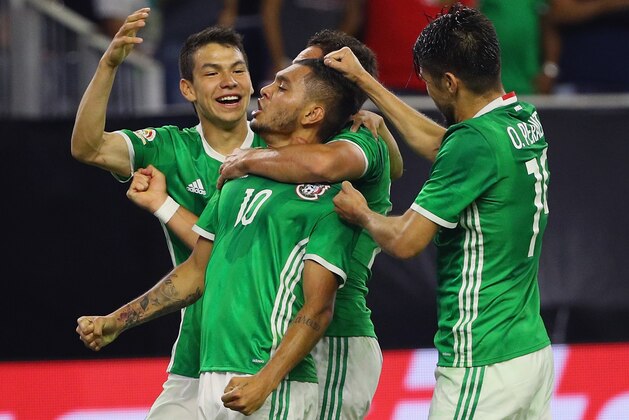 HOUSTON, TX - JUNE 13:  Jesus Manuel Corona #10 of Mexico celebrates a second half goal with his teammates during the 2016 Copa America Centenario Group match between Mexico and Venezuela at NRG Stadium on June 13, 2016 in Houston, Texas.  (Photo by Scott Halleran/Getty Images)