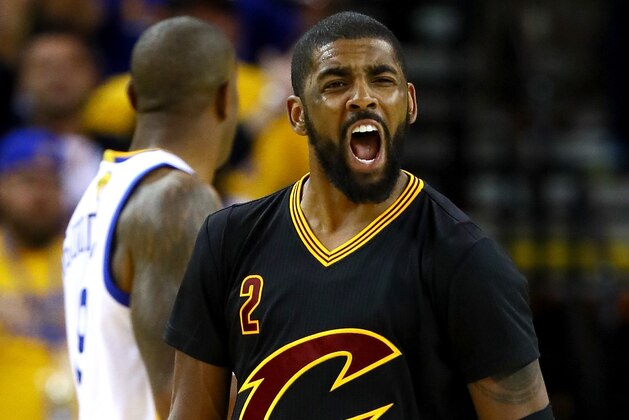 OAKLAND, CA - JUNE 13:  Kyrie Irving #2 of the Cleveland Cavaliers reacts during the fourth quarter against the Golden State Warriors in Game 5 of the 2016 NBA Finals at ORACLE Arena on June 13, 2016 in Oakland, California. NOTE TO USER: User expressly acknowledges and agrees that, by downloading and or using this photograph, User is consenting to the terms and conditions of the Getty Images License Agreement.  (Photo by Ezra Shaw/Getty Images)