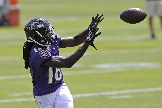 Baltimore Ravens wide receiver Breshad Perriman prepares to catch a pass during NFL football minicamp, Tuesday, June 16, 2015, in Owings Mills, Md. (AP Photo/Patrick Semansky)