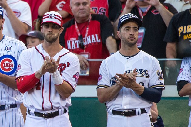 CINCINNATI, OH- JULY 14: National League All-Stars Yadier Molina #4 and Carlos Martinez #18 of the St. Louis Cardinals, AJ Pollock #11 of the Arizona Diamondbacks, Kris Bryant #17 of the Chicago Cubs, Bryce Harper #34 of the Washington Nationals and Ryan Braun #8 of the Milwaukee Brewers look on prior to the 86th MLB All-Star Game at the Great American Ball Park on July 14, 2015 in Cincinnati, Ohio. The American League defeated the National League 6-3. (Photo by Brace Hemmelgarn/Minnesota Twins/Getty Images)