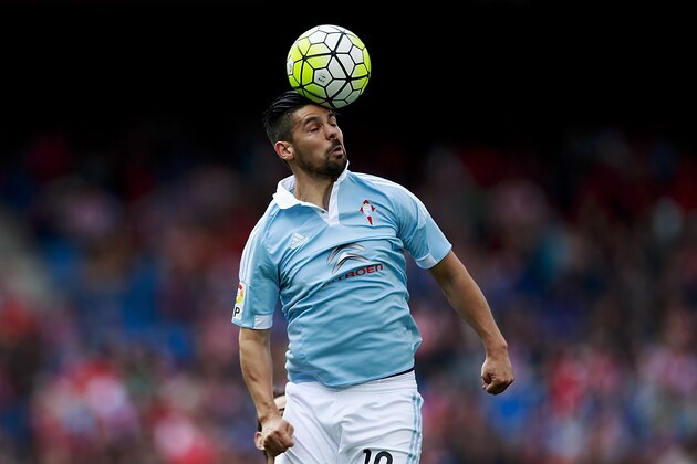 MADRID, SPAIN - MAY 14: Manuel Agudo Duran alias Nolito of RC Celta de Vigo saves on a header during the La Liga match between  Club Atletico de Madrid and Real Club Celta de Vigo at Vicente Calderon Stadium on May 14, 2016 in Madrid, Spain. (Photo by Gonzalo Arroyo Moreno/Getty Images)