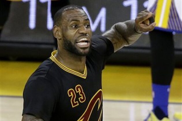 Cleveland Cavaliers forward LeBron James (23) gestures during the first half of Game 5 of basketball's NBA Finals against the Golden State Warriors in Oakland, Calif., Monday, June 13, 2016. (AP Photo/Eric Risberg)