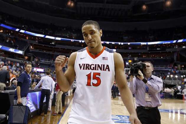 Virginia guard Malcolm Brogdon (15) celebrates as he leaves the court after an NCAA college basketball game against Miami in the Atlantic Coast Conference men's tournament Friday, March 11, 2016, in Washington. Virginia won 73-68. (AP Photo/Alex Brandon)