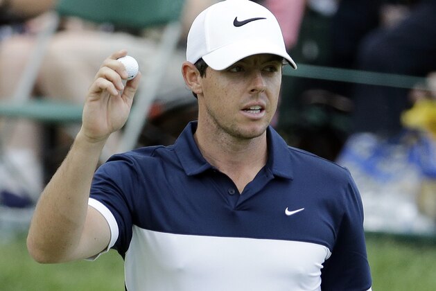 Rory McIlroy, of Northern Ireland, acknowledges the patrons after his round during the final round of the Memorial golf tournament, Sunday, June 5, 2016, in Dublin, Ohio. (AP Photo/Darron Cummings)