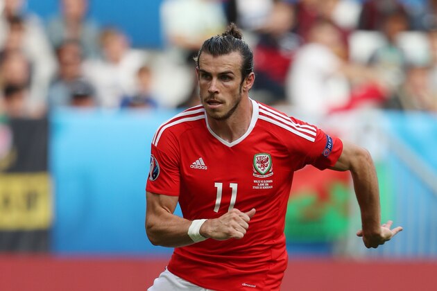 BORDEAUX, FRANCE - JUNE 11: Gareth Bale of Wales during the UEFA EURO 2016 Group B match between Wales and Slovakia at Stade Matmut Atlantique on June 11, 2016 in Bordeaux, France. (Photo by Matthew Ashton - AMA/Getty Images) BORDEAUX, FRANCE - JUNE 11: Gareth Bale of Wales during the UEFA EURO 2016 Group B match between Wales and Slovakia at Stade Matmut Atlantique on June 11, 2016 in Bordeaux, France. (Photo by Matthew Ashton - AMA/Getty Images)