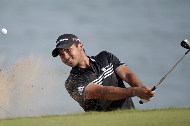 Jason Day, of Australia, hits out of a bunker on the 12th hole during the fourth round of the PGA Championship golf tournament Sunday, Aug. 16, 2015, at Whistling Straits in Haven, Wis. (AP Photo/Jae Hong)